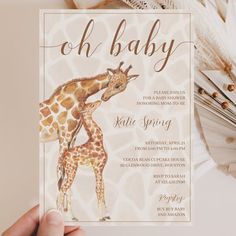 a baby giraffe and its mother are shown in this printable card with the words oh baby on it