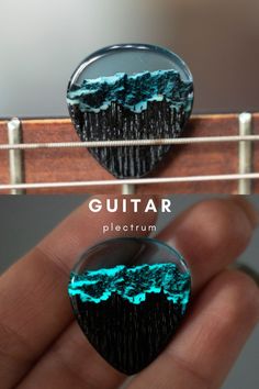 a guitar picker with the words guitar plectum on it's back