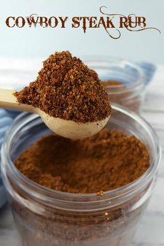 a wooden spoon filled with brown powder and the words cowboy steak rub on top of it