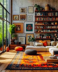 a living room filled with lots of furniture and bookshelves covered in pictures on the wall