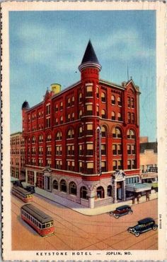 an old postcard with a building and cars in the street below it that says keytone hotel, john m