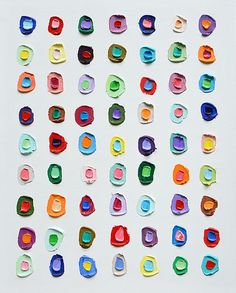 an abstract painting with multicolored circles on white paper