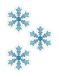 three snowflakes with blue and green designs on them, all in the same pattern