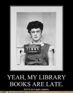 a woman holding a sign that says yeah, my library books are late