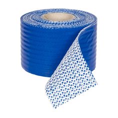 a roll of blue adhesive tape with white geometric designs on the side and one roll is