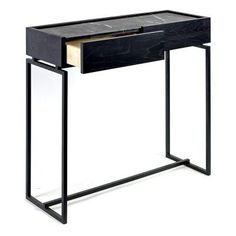 a black and white desk with an open drawer
