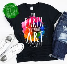 "Earth without art is just eh T-Shirt: What would the world be without art and artists? Pretty monotonous and boring: just \"Eh\". Art brings color to the earth and into our lives. Funny art saying, quote and pun for artists, art teachers, painters and art lovers. Art saying and funny colored art pun - As a painter, student in art history or graphic design you will know this pretty well. Perfect for art teacher, painter, art lover, artist for painting, colorful drawing at art school artistic talent. I love this art. ♥ ♥ ♥ ♥ ♥ ♥ This awesome Gildan 64000 softstyle t-shirt is a staple every wardrobe should have. The shirt is made of durable cotton fabric and has a double-stitched bottom hem and sleeves. This shirt is long-lasting enough to become your everyday favorite! * Solid colors are 10 Art, Graphic Design, Shirts, Art Teachers, Art Teacher, Art Teacher Gifts, Art Puns, Art Jokes, Art School