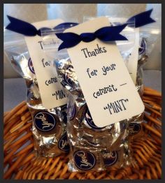 some kind of candy in a wicker basket with tags attached to the bags that say thank you for your comfort mints