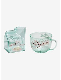 two glass cups with designs on them