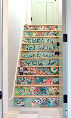 the stairs are decorated with colorful wallpapers and handwritten words that read, dreams don't work unless you do