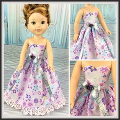 the doll is wearing a purple dress with flowers on it