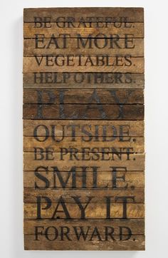 a wooden sign with words on it that says, be grateful eat more vegetables help others