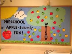 a classroom bulletin board with apples on it