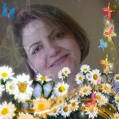 a woman is smiling and surrounded by daisies in front of a butterfly - themed background