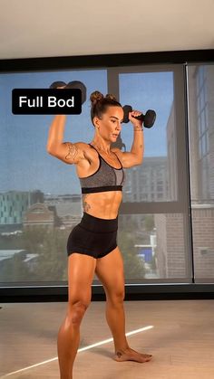 a woman is doing exercises with dumbbells in front of a window and the words full bad above her head