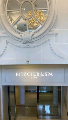 the entrance to ritz club and spa