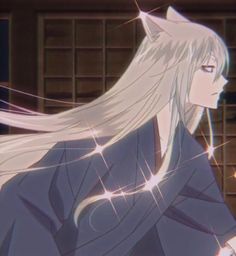 an anime character with long white hair and blue eyes looking at something in the distance