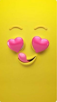 a smiley face with two pink hearts on it's nose and eyes, against a yellow background
