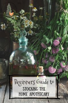 a vase filled with flowers next to a sign that says beginners guide to stocking the home apothecary
