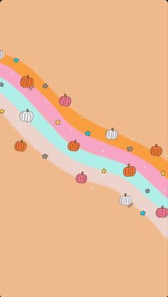an orange and pink background with pumpkins on it