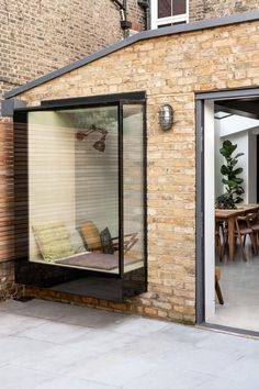 an outdoor patio with sliding glass doors leading to the outside