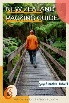 a man walking across a wooden bridge in the forest with text overlay that reads new zealand packing guide