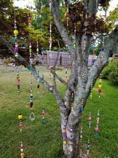 a tree with beads hanging from it's branches
