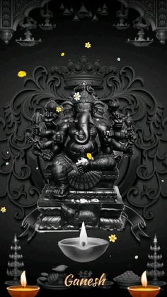 an image of ganesh with candles