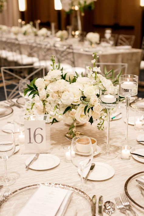 All white floral centerpiece with ranunculus and roses for a winter wedding reception at Omni Barton Creek in Austin | JennyDeMarco Photography #austinwedding #austinweddingphotographer #winterwedding Wedding Decor, White Wedding Centerpieces, White Floral Centerpieces, White Wedding Table Centerpieces, Rose Centerpieces Wedding, White Wedding Flowers Centerpieces, Wedding Floral Centerpieces, Wedding Floral Arrangements Centerpieces, Peonies Wedding Centerpieces