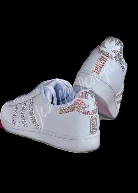 🌟 Sport Luxe Kicks! 🌟 Our Original Crystal Design! Custom Hand Jeweled with PREMIUM SWAROVSKI CRYSTALS by Jezelle Designs. 💎SHOE COLOR for this listing:  ALL White    ANY and ALL colors may be available in your size!  See pics above for examples. Message for a custom order. for these or any colors you'd like.  💎CRYSTAL COLOR:  AB (Aurora Boreale) an iridescent color  Other crystal colors, sneaker colors & style options are available. Message if interested. 💎SIZES: Sold in Women's sizes. 💎 Barbie, Diy, Trainers, Glitter Sneakers, Bling Shoes, Rhinestone Shoes, Glitter Shoes, Rhinestone Football, Custom Sneakers Diy