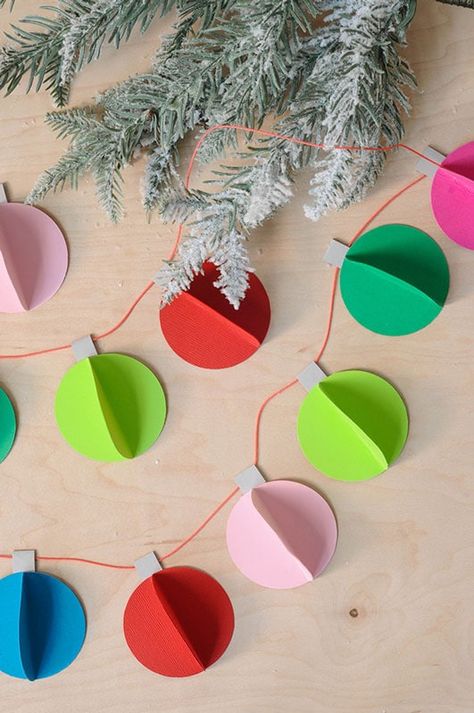 Kids will love to make make this simple DIY paper Christmas ornament garland this holiday! #ad @aleenesdiy Diy, Crafts, Diy Paper Christmas Tree, Paper Christmas Tree, Diy Christmas Paper Decorations, Diy Christmas Paper, Christmas Crafts With Paper, Paper Christmas Decorations, Christmas Paper Crafts