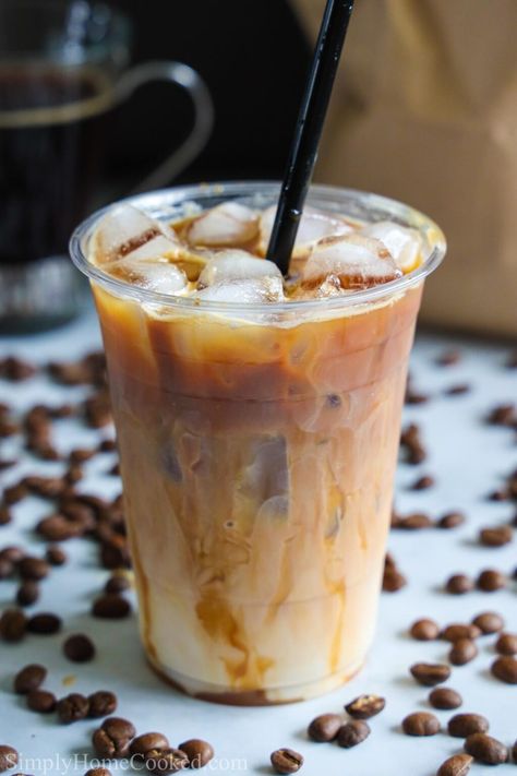 This Iced Caramel Macchiato is sweet and refreshing. If you're looking for an easy cold coffee for the summer, this recipe has got you covered. #macchiato #caramelmacchiato #icedcaramelmacchiato #icedcaramelmacchiatorecipe Dessert, Coffee Recipes, Desserts, Summer, Caramel Latte, Iced Caramel Macchiato Recipe, Caramel Macchiato Recipe, Ice Caramel Macchiato, Coffee Drinks