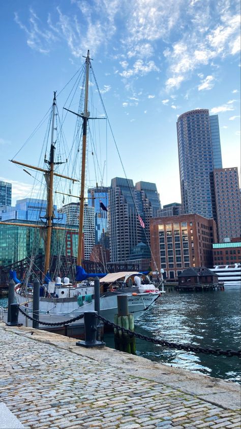 Skyline view of Boston in the Seaport with a beautiful boat docked in Boston Harbor Boston, East Coast Travel, Boston Harbor, Boston Massachusetts, Moving To Boston, Boston Summer, Boston Usa, Usa Travel Destinations, Travel Usa