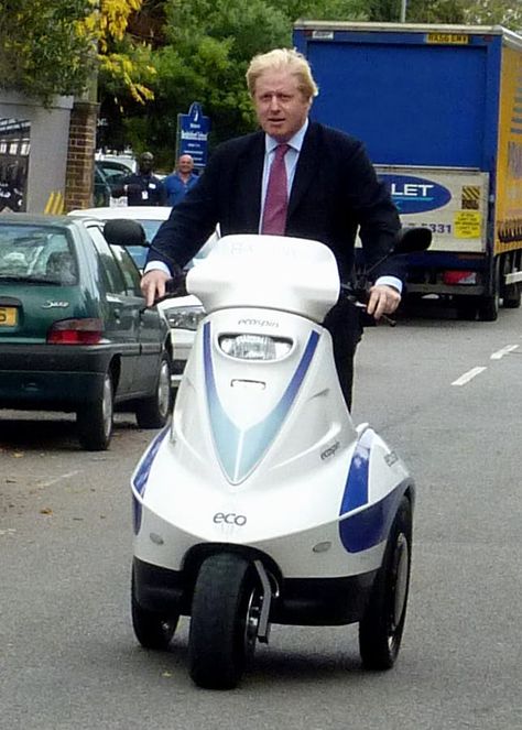 London Mayor Boris Johnson taking a Raptor for a quick spin Scooters, Three Wheel Electric Scooter, Electric Tricycle, Car Wheels, Electric Bicycle, Electric Vehicle, Electric Scooter, Custom Bicycle, Atv