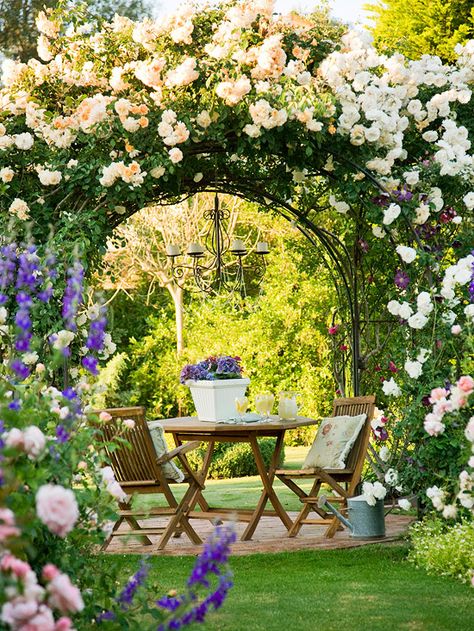 A romantic rose-covered arbor makes this elegant patio a show-stopper. Find more beautiful arbors: http://www.bhg.com/gardening/landscaping-projects/landscape-basics/arbors-and-trellises-in-the-landscape/?socsrc=bhgpin071012#page=2 Trellis, Shaded Garden, Outdoor, Garden Gates, Garden Arch, Garden Landscaping, Shade Garden, Garden Inspiration, Outdoor Gardens