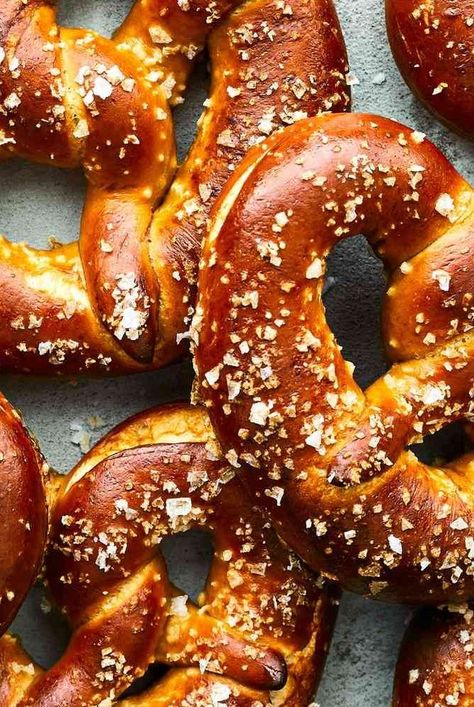 These golden, chewy soft pretzels are easy to make at home with these step-by-step tips and a can't-miss Food & Wine pretzel recipe. #bakingideas#breadideas#breadrecipes#bakingrecipes Pretzel, Homemade Pretzels Recipe, Homemade Soft Pretzels, Homemade Pretzels, How To Make Pretzels, Pretzels Recipe, Mall Pretzel Recipe, Easy Pretzel Recipe, Soft Pretzel Recipe