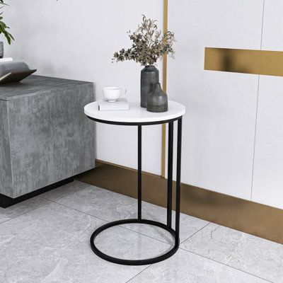 It can easily be used as a side table in your living room, a nightstand in your bedroom, or a nifty work surface wherever needed. Crafted with a durable laminate top surface and metal frame with a round base, giving it a gorgeous luxe factor that will look good in whichever room you choose to showcase it in. Black, Bedroom, White, Frame, Black Gray, Apartment, House Interior, Marble, Interior Furniture