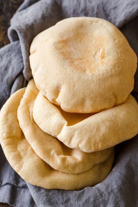 This homemade Pita Bread Recipe puffs up beautifully to form a pocket inside. Learn how to make Pita Bread with oven and stovetop methods. Bread Recipes, Biscuits, Muffin, Breads, Homemade Pita Bread, Pita Bread Recipe, Pita Bread, Pita Pocket Recipes, Pitta Bread