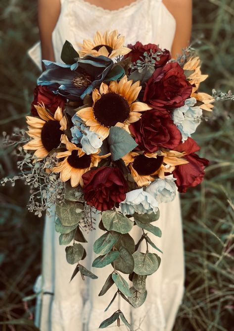 This is a wedding package designed for a fascinating sunflower, burgundy and blue hue Theme wedding. This beautiful fall inspired wedding flower package will complete your wedding needs. Available with ribbon or twine wrapped base. Wedding package includes the following: 👉🏼 X1 Bridal Bouquet 👉🏼 X6 Bridesmaid Bouquets 👉🏼 X6 Boutonnieres 👉🏼 X2 Corsages ❤️ Handmade in the USA with love & care ❤️ ✅ Wow your guests with this realistic classic one of a kind style ✅ Hassle free- ready to Floral, Fall Bridal Bouquet October, Fall Wedding Bouquets, Fall Wedding Bouquets Burgundy, Fall Wedding Flowers, Sunflower Wedding Bouquet, Autumn Wedding Bouquet, Fall Bouquets, Bridal Bouquet Fall