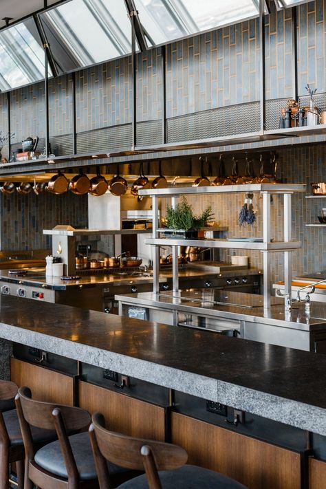 an open kitchen with a counter lined with stools Restaurant Kitchen Design, Kitchen Restaurant Design, Restaurant Kitchen, Open Kitchen Restaurant, Restaurant Interior Design, Commercial Kitchen Design, Restaurant Interior, Open Restaurant, Commercial Kitchen