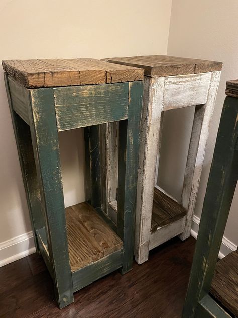 "A Rustic and wonderful vintage-looking reclaimed end table. It's very modern and also country style.  It'll ship out all assembled and no installation is needed. You only need to open up the box and enjoy this beauty. Surfaces are sealed with a wood sealer for long-lasting. It's made out of reclaimed wood which means it may have random holes or dents or nails which makes it a vintage look. Since this is handmade furniture, every table will come with slightly different distressed marks. Dimensions: 10\"L X 10\" W X 26\"H (15\" height bottom shelf area) Anti-scratch \"FELT PADS\" are attached to the bottom of all 4 legs. *SCRATCH FREE* **Please message us if you want a different size or color combination. **We only ship to the lower 48 states. (We can ship to Alaska, and Hawaii for an addit Design, Alaska, Reclaimed Barn Wood, Reclaimed Wood Furniture, Rustic Console Tables, Farmhouse End Tables, Wood End Tables, Rustic Side Table, Rustic End Tables