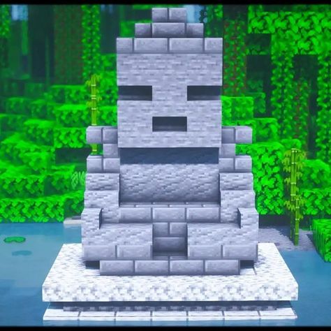 Do you want to capture a Buddha statue's peaceful and serene vibe? Then why not try this build-out? It's perfect for a forest biome or a jungle biome. Add a little more texture to it and customization for depth. It will surely turn out greater! Check this build now! Minecraft Crafts, Buddha, Architecture, Statue, Design, Minecraft Designs, Minecraft Statues, Medieval, Cool Minecraft Houses