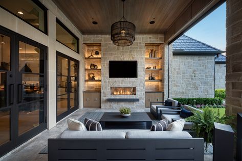 We're getting fired up with this indoor/outdoor space. With the help of motorized retractable screens, you can enjoy this space all year long. Fresh air, shade from the sun, climate control, protection from insects or a bit of privacy. Designed/Built by Tal Thevenot of Aquaterra Outdoors, in Carrollton, Texas. Photographed by Jimi Smith Photography www.jimismithphotography.com Design, Interior, Inspiration, Screened In Patio, Indoor Outdoor Kitchen, Indoor Outdoor Living Room, Indoor Outdoor Living, Screened In Porch, Outdoor Living Areas