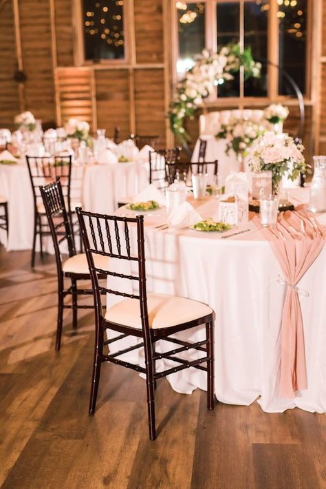 Guests sat at round tables with white tablecloths and pink runners in the authentic renovated dairy barn at this pink fall wedding at 48 Fields in Northern Virginia. #barnwedding #fallwedding #pinkwedding #receptiondecor #weddingreception #floralring #moongate #virginiawedding #weddingvenue Floral, Fall Wedding Table Settings, Wedding Tablecloth Ideas Round Tables, Wedding Tablecloths, Wedding Table Runners, Wedding Tablescapes, Wedding Tablescapes Round, Wedding Reception Table Decorations, Round Wedding Reception Tables
