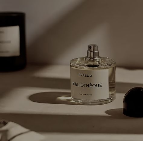 Byredo's 'Bibliothèque' candle is the brand's best-seller, so it makes sense they'd create an Eau de Parfum, too. It opens with sweet top notes of Peach and Plum before settling into a flowery base of Peony and Violet with a hint of Musk. Recalling the scent of a library, this fragrance leaves an aroma of Leather blended with Vanilla and Patchouli to recall the well-worn pages of your favorite books and moments spent reading on antique furniture. Perfume, Fragrance, Scent, Byredo Candle, Eau De Parfum, Aroma, Popular Candles, Patchouli, Spray