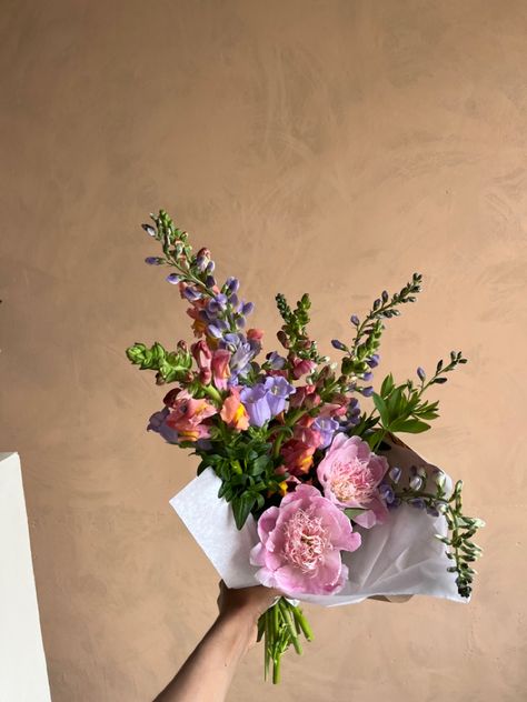 A sweet handwrapped bouquet using local peonies, baptisia, snapdragons, and snapdragons. Wildflower Bouquet, Flowers Bouquet, Dried Bouquet, Peonies Bouquet, Purple Flower Bouquet, Floral Bouquets, Hydrangea Bouquet, Flower Bouquet Wedding, Beautiful Bouquet Of Flowers