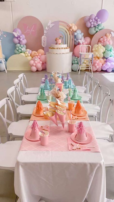 Butterfly Kisses and Rainbow Wishes | CatchMyParty.com Rainbow Party Decorations, Rainbow Birthday Party Decorations, Rainbow Theme Party, Butterfly Themed Birthday Party, Birthday Party Theme Decorations, Rainbow Themed Birthday Party, Pastel Themed Birthday Party Decorations, Butterfly Birthday Party Decorations, 1st Birthday Girl Party Ideas