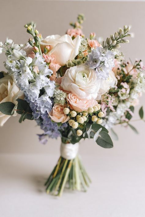Pastel Blue and Pink Bouquet full of scent and texture. Flowers include Stocks, Delphiniums, Roses, Waxflower, & Hypericum Pastel, Bouquets, Ivory Roses, Light Pink Bouquet, Pink Peony Bouquet, Blush Roses, Pink Hydrangea Bouquet, White Bouquet, Pink Flower Bouquet