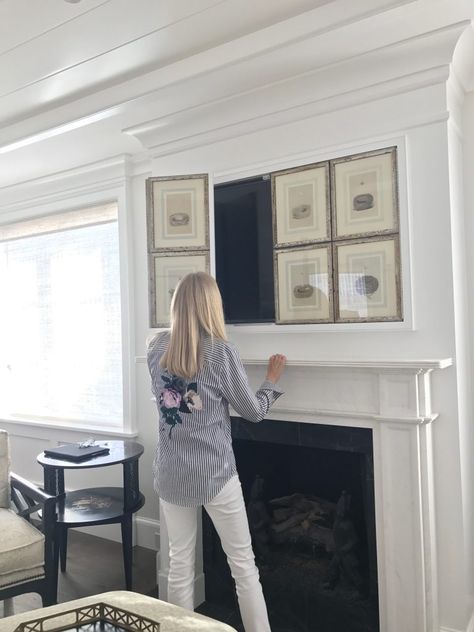 The perfect way to hide your TV! Home, Home Décor, Tv Above Fireplace, Tv Over Fireplace, Hide Tv Over Fireplace, Hidden Tv Cabinet, Fireplace Tv Wall, Above Fireplace Decor, Tv Cover Up