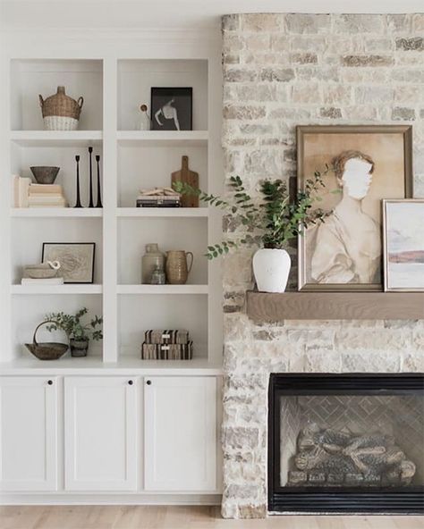 How pretty is this whole fireplace/built-in situation? Make sure to check out Oakstone Homes for a lot more gorgeous design inspiration. 1. This wallpaper is so pretty and would look so good with a dark paint color.2. We’re loving this trend back to caned furniture and think this caned bed look so good with the … Home Décor, Modern Farmhouse Fireplace, Home Fireplace, Fireplace Built Ins, Off Center Fireplace, Fireplace Remodel, Fireplace Design, Home Living Room, Home And Living